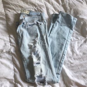 Girls light washed distressed jeans